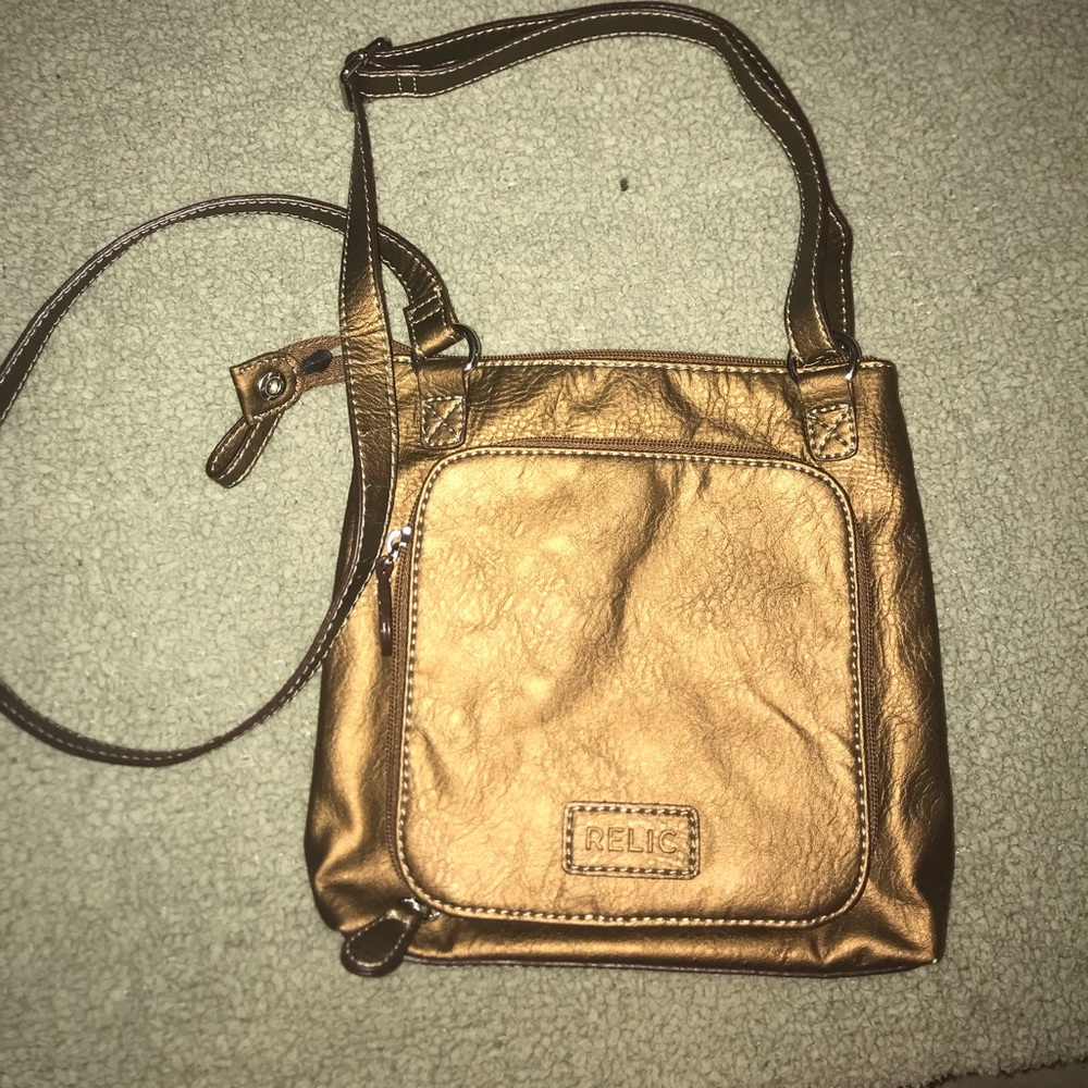 Relic cross body bronze purse